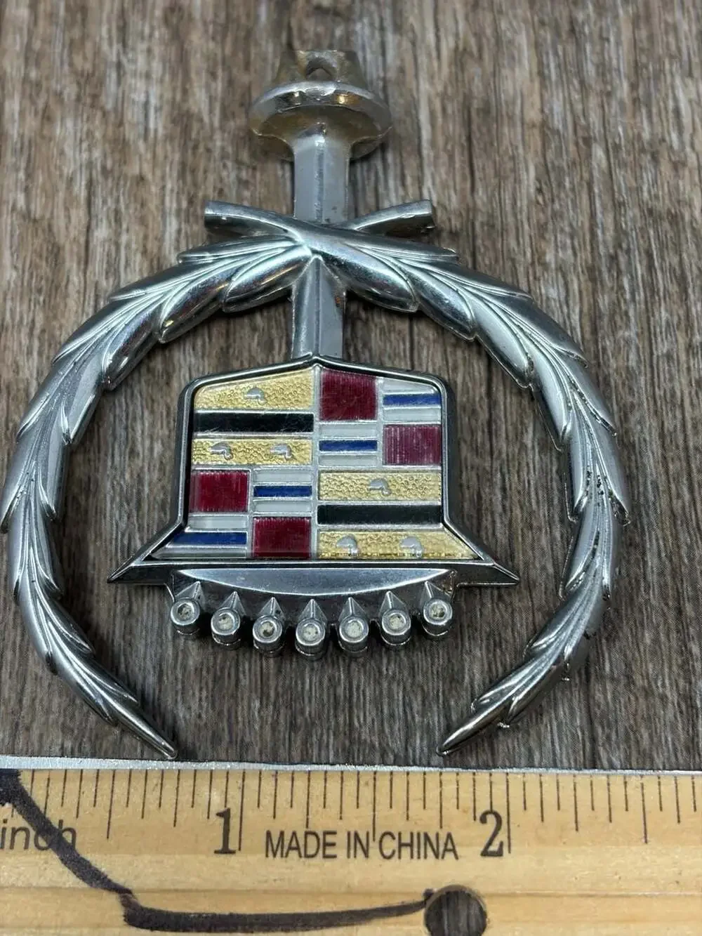 Vintage Iconic GM Cadillac crest and wreath hood ornament emblem with gold birds